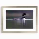 Elegant wall art featuring a heron and egret design in a silver frame, showcasing intricate details and a contemporary aesthetic, perfect for home decor.