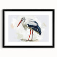 Elegant black-framed wall art showcasing a heron and egret design, featuring intricate details and a mat for an enhanced display, perfect for nature enthusiasts.