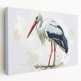Elegant stretched canvas wall art showcasing a heron and egret design in soft pastel colors, perfect for enhancing home decor and nature-themed interiors.