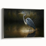 Framed wall art featuring elegant herons and egrets in a serene nature scene, displayed with a silver frame, ideal for enhancing home decor. Perfect for bird lovers and art enthusiasts seeking a touch of tranquility.