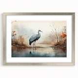 Framed wall art featuring a heron and egret design in a silver frame with matting, ideal for enhancing home decor with nature-inspired elegance.