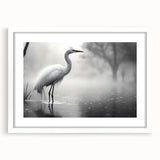 Framed wall art featuring a serene heron and egret design, elegantly displayed with a white mat. Ideal for enhancing home decor with nature-inspired elegance.