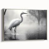 Framed canvas wall art collection featuring elegant herons and egrets in a serene design, accented with a silver frame, ideal for modern living spaces.