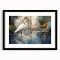Framed wall art featuring a heron and egret design, showcasing a black frame with a mat, ideal for enhancing modern home decor. Perfect for nature lovers and art enthusiasts.