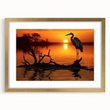 Elegant gold-framed wall art featuring a heron and egret design, showcasing intricate details and vibrant colors, perfect for enhancing home decor.