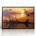 Framed wall art featuring a striking design of a heron and egret, presented in a sleek black frame, perfect for enhancing modern home decor with nature-inspired elegance.