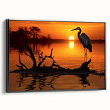 Framed wall art featuring a serene heron and egret design, showcasing intricate details and a sleek black frame, perfect for enhancing modern decor.