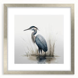 Framed wall art showcasing a serene heron and egret design, featuring a silver frame, matting, and elegant details that enhance any decor. Perfect for nature lovers.