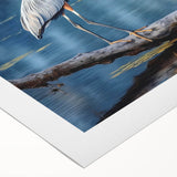 Elegant rolled canvas wall art showcasing a heron and egret design, featuring soft hues of blue and white, perfect for coastal decor, presented in a protective tube.