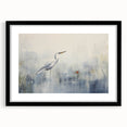 Framed wall art showcasing a heron and egret design, featuring a sleek black frame and mat, perfect for enhancing modern home decor. Ideal for nature lovers.