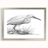 Elegant silver-framed wall art featuring a heron and egret design, set against a neutral mat background, perfect for enhancing modern home decor and nature-themed interiors.