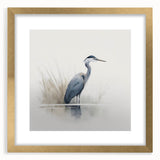 Elegant wall art featuring a heron and egret design in a gold frame, accented with a white mat, perfect for enhancing home decor with nature-inspired elegance.