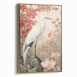 Framed canvas wall art featuring a serene design of herons and egrets in soft colors, accented with a gold frame, ideal for enhancing any living space decor.