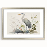 Stylish wall art featuring a heron and egret design, framed with a silver mat, perfect for enhancing modern decor and bird-themed interiors.