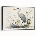Framed wall art featuring a black heron and egret design on textured canvas, showcasing elegant bird silhouettes against a neutral background, perfect for home decor.
