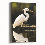 Framed wall art collection featuring elegant heron and egret designs on textured canvas, showcased with a silver frame, ideal for modern home decor.