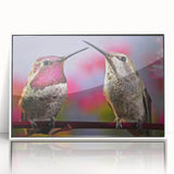 Framed acrylic wall art showcasing a vibrant hummingbird design in a white frame, perfect for adding a touch of nature-inspired beauty to any modern decor.