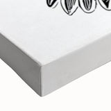 Close-up view of a vibrant hummingbird design on stretched canvas wall art, showcasing intricate details and rich colors, perfect for nature lovers' decor.