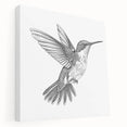 Stretched canvas wall art featuring a vibrant hummingbird design, showcasing intricate details and vivid colors, ideal for adding a touch of nature to home decor.