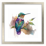 Framed wall art featuring a vibrant hummingbird design in a silver frame, accentuated with a mat, perfect for enhancing home decor with nature-inspired elegance.