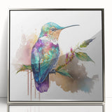 Framed acrylic wall art featuring a vibrant hummingbird design in silver tones, showcasing intricate details and a modern aesthetic for home decor.