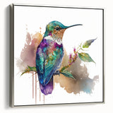 Framed canvas wall art featuring a vibrant hummingbird design in silver tones, showcasing intricate details and elegant framing, perfect for enhancing interior decor.