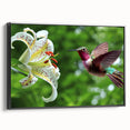 Framed wall art featuring a vibrant hummingbird design on black canvas, showcasing intricate details and a sleek side view, perfect for modern decor.