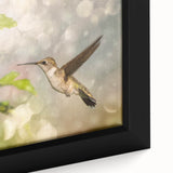 Close-up of a beautifully framed hummingbird wall art piece, showcasing vibrant colors and intricate details, perfect for enhancing any living space decor.