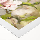 Colorful rolled canvas artwork showcasing a vibrant hummingbird design, ideal for home decor, presented in a protective cardboard tube for safe shipping.