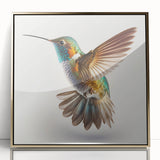 Framed wall art featuring a vibrant hummingbird design in acrylic with a gold frame, showcasing intricate details and bright colors, perfect for home decor.