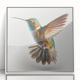 Framed wall art featuring a vibrant hummingbird design in acrylic, set against a white background, perfect for adding a pop of color to any decor.