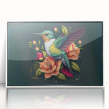 Framed wall art featuring an intricate hummingbird design in vibrant colors, displayed with a sleek white frame, perfect for adding a touch of nature-inspired decor to any space.