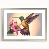 Detailed wall art featuring a silver-framed hummingbird design, showcasing vibrant colors and intricate details, perfect for enhancing modern home decor.
