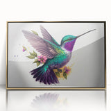 Framed wall art featuring a vibrant hummingbird design in a gold-acrylic frame, showcasing intricate details and colorful patterns, perfect for nature enthusiasts.
