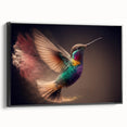 Framed canvas wall art showcasing a vibrant hummingbird design in a black frame, viewed from the side, ideal for adding a colorful touch to home decor. The intricate details and vivid colors highlight the beauty of nature, making it a perfect focal point for any room.