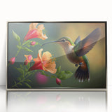 Framed acrylic wall art featuring a vibrant hummingbird design in shades of blue and green, elegantly displayed with a silver frame, ideal for nature-inspired decor.