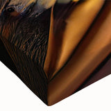 Close-up of vibrant hummingbird wall art on stretched canvas, showcasing intricate details and rich colors, perfect for home decor and nature enthusiasts.