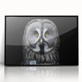 Framed wall art featuring a detailed owl design with vibrant colors, set in a sleek black frame, perfect for enhancing modern decor and wildlife themes.
