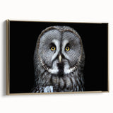 Framed canvas wall art featuring a majestic owl design in gold tones, showcased from a side view, perfect for nature-inspired home decor.