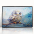 Framed black acrylic wall art featuring a detailed owl design, perfect for contemporary home decor. This striking piece adds a touch of nature-inspired elegance to any living space.