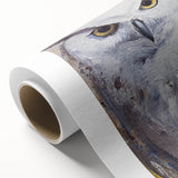 Rolled canvas artwork showcasing a stunning owl design in vibrant colors, ideal for home decor, packaged securely in a cardboard tube for safe delivery.