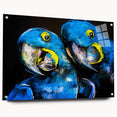 Vibrant wall art featuring a colorful parrot design on acrylic glass, showcasing a side view with decorative pins, perfect for brightening any living space.