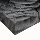 Vibrant close-up of a stretched canvas wall art featuring colorful parrots in a tropical setting, ideal for adding a lively touch to home decor.