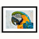 Framed wall art featuring a vibrant parrot design with a black mat, perfect for enhancing home decor and showcasing tropical themes in living spaces.