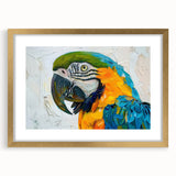 Framed wall art featuring a vibrant design of colorful parrots against a gold mat, ideal for adding a tropical touch to home decor. Perfect for bird lovers.
