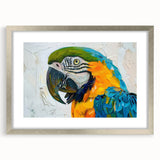 Framed wall art collection showcasing vibrant parrots in a colorful design, featuring a sleek silver frame and mat, perfect for adding tropical flair to any space.