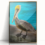 Framed wall art featuring a pelican design with a gold-acrylic finish, showcasing intricate details and vibrant colors, perfect for enhancing coastal-themed decor.