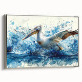 Framed wall art featuring a silver side view of a pelican, showcasing intricate details and vibrant colors, perfect for coastal home decor or bird enthusiasts.
