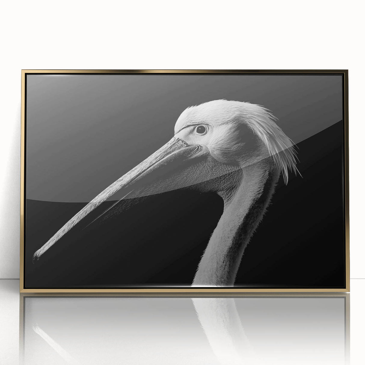 Framed acrylic wall art showcasing a gold-accented pelican design, ideal for coastal decor, enhancing any living space with its elegant front view.