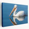 Stretched canvas wall art featuring a side view of a colorful pelican design, perfect for enhancing coastal-themed home decor with vibrant hues and intricate details.